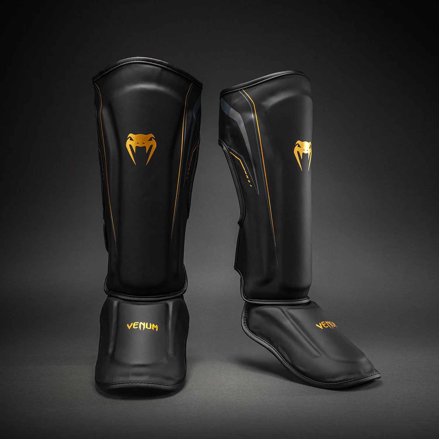 Venum Streamline Schienbeinschoner – Schwarz/Gold