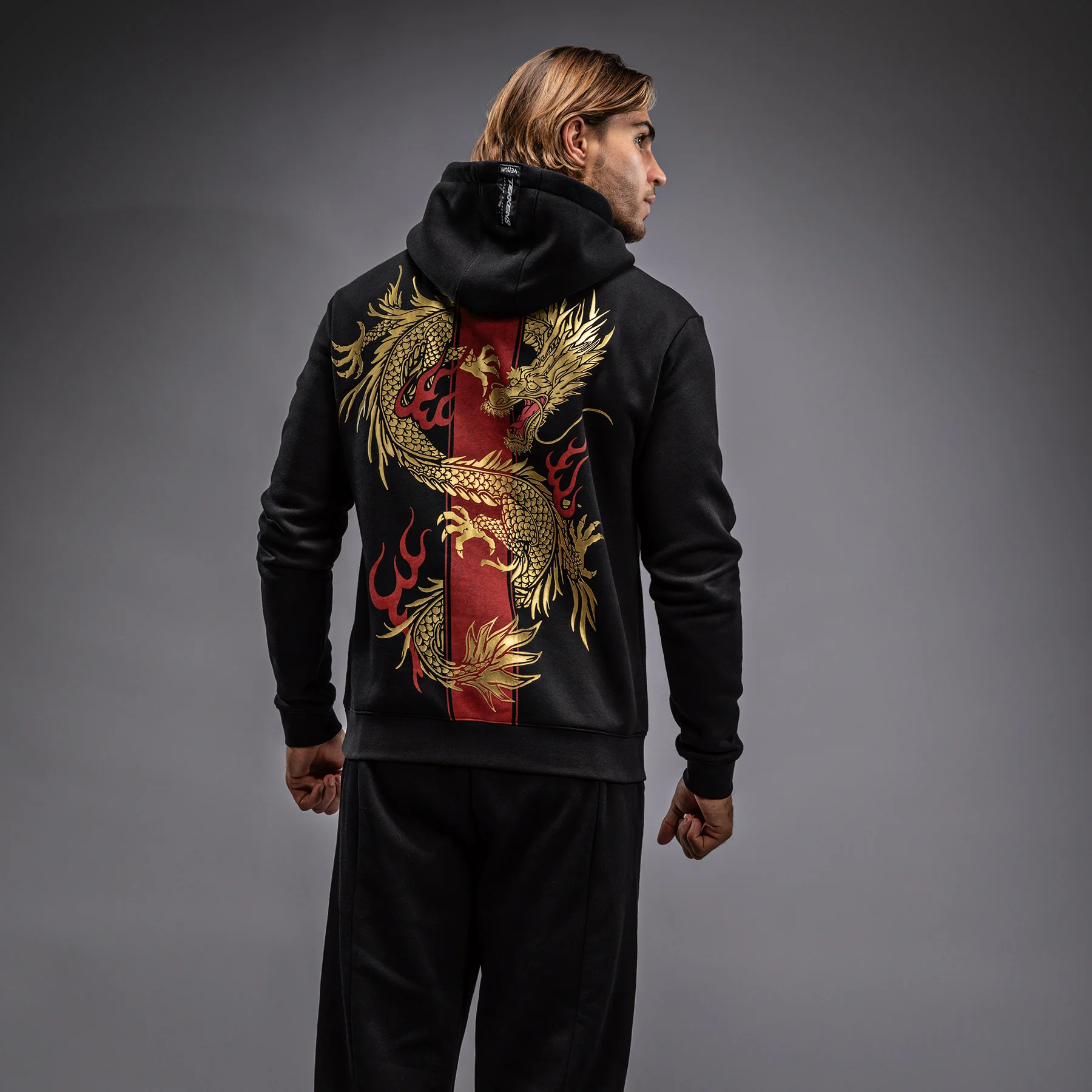 Venum x TEKKEN 8 - Marshall Law Hoodie - Schwarz/Rot/Gold