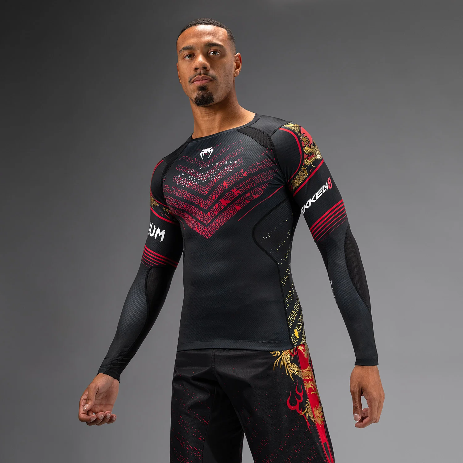 Venum x TEKKEN 8 - Marshall Law Rashguard - Schwarz/Rot/Gold